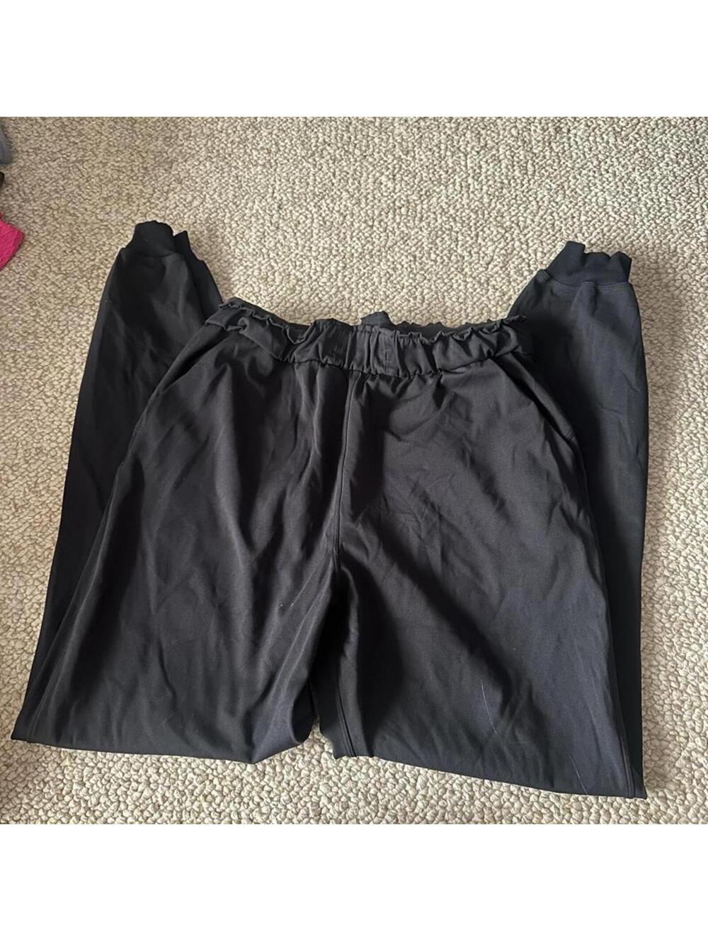 Black Lululemon joggers with elastic waistband